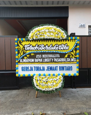 Papan Bunga Duka di Girian Permai